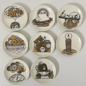 FORNASETTI PIERO, Otto sottobicchieri decoro "Monete" per Banca Unione Milano